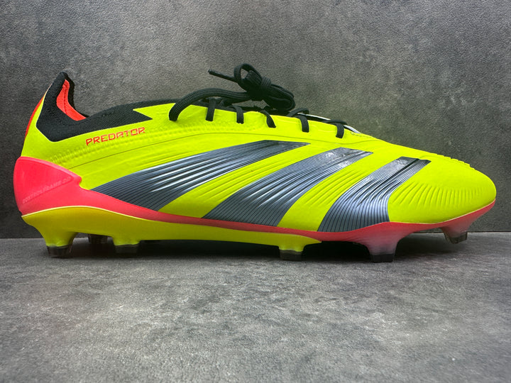 A pair of Adidas Predator Elite FG soccer cleats in bright green color with black and gray accents, featuring a string bag.
